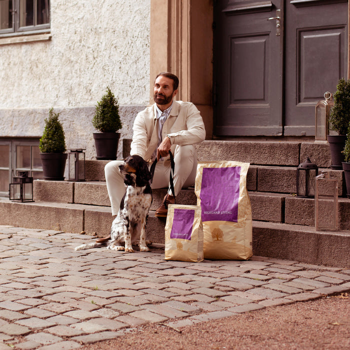 essential foods man with puppy.