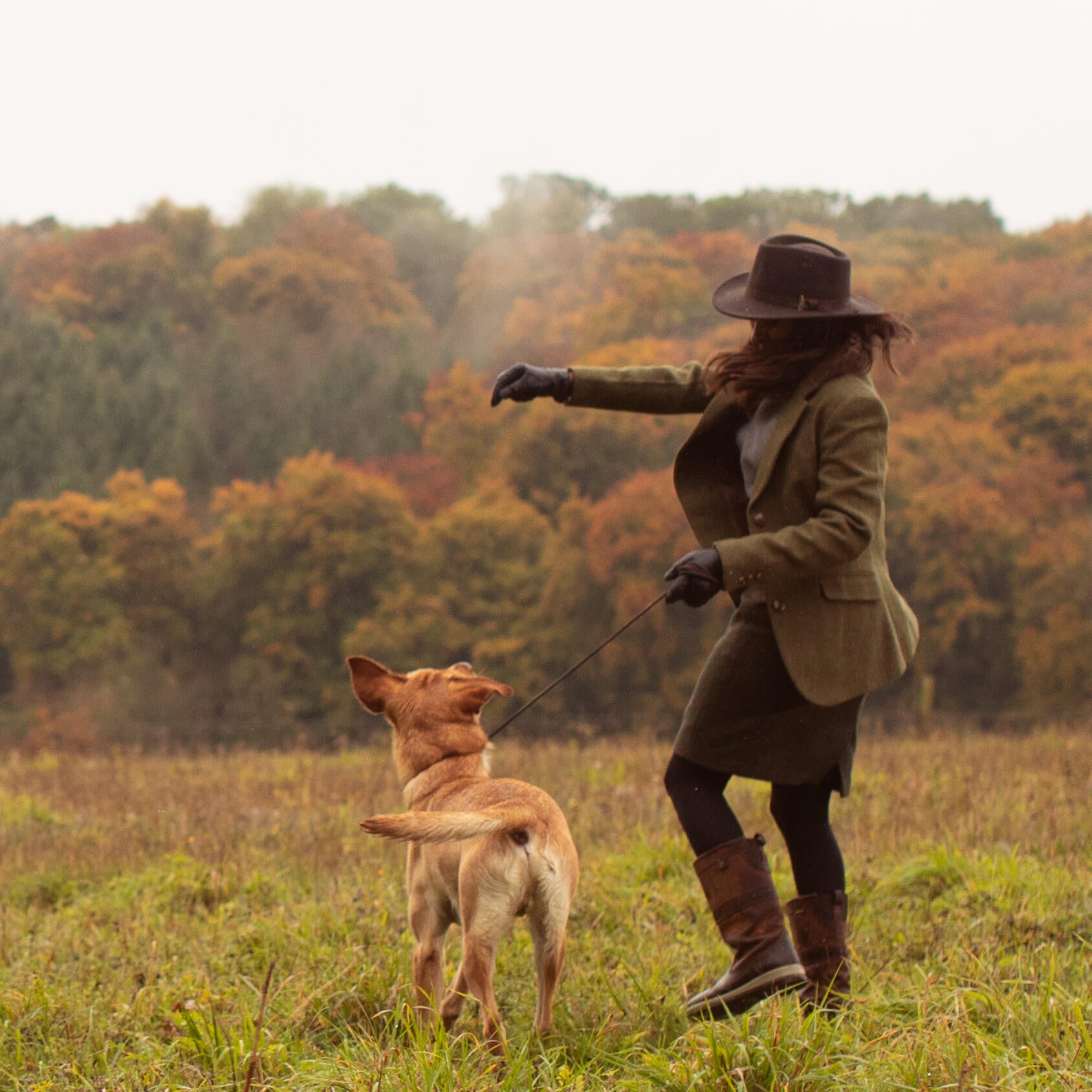 Women playing with her Labrador